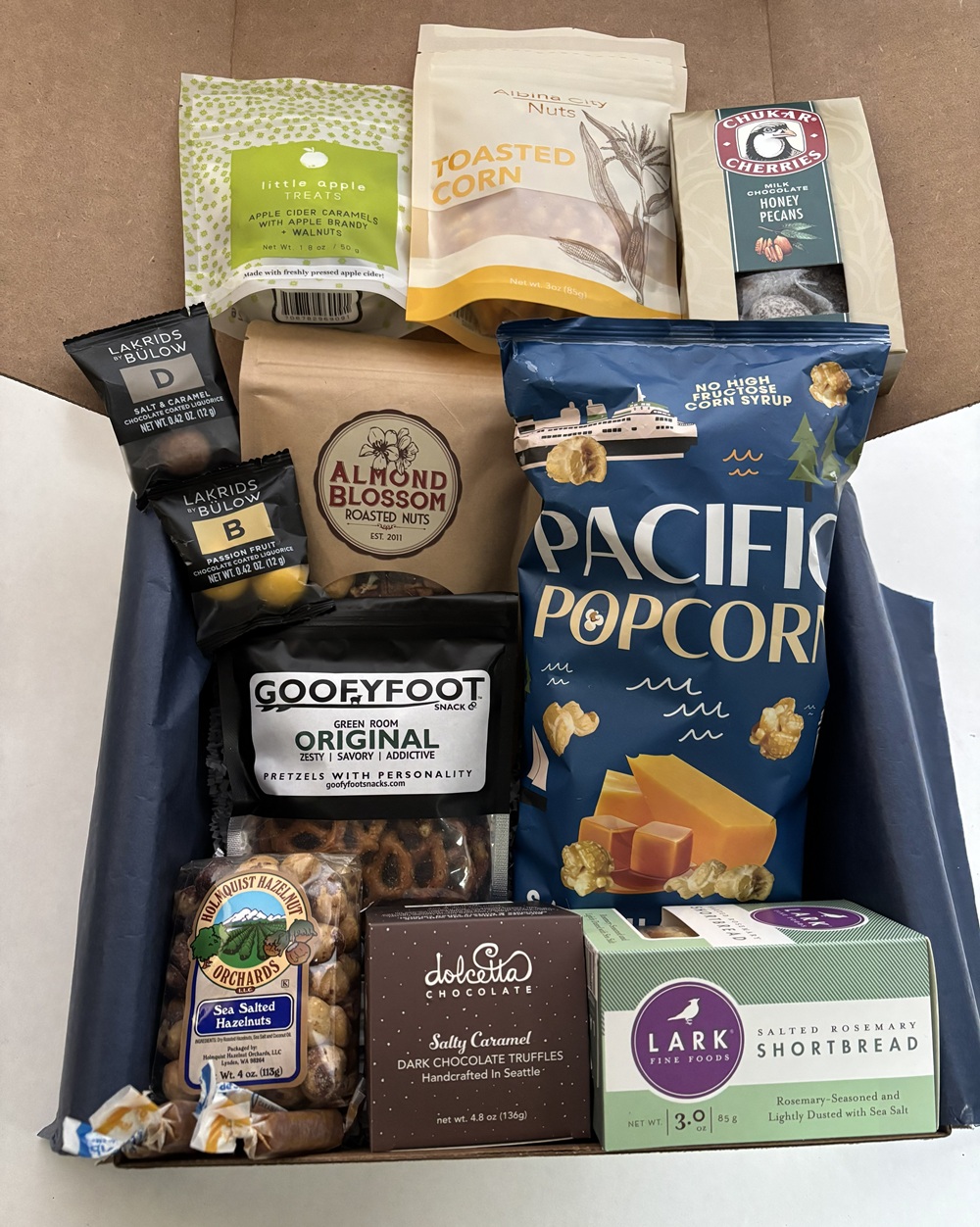 Holiday Munch Box - $100-contents-blue tissue-white box