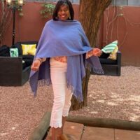 Customer Camille G enjoying her Atlantic Blue Mer-Sea Travel Wrap in Spain!